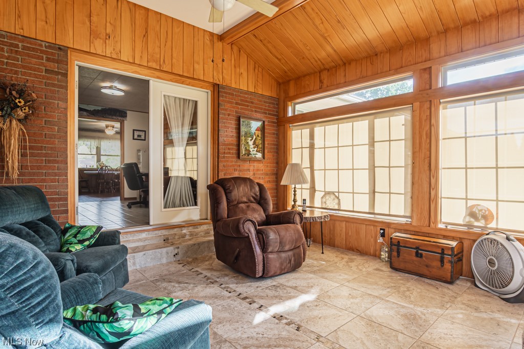 31207 Tower Road Salem, OH 44460 - Photo 26 of 34 All Seasons riin with vaulted ceiling, ceiling fan, a wealth of natural light, and wooden ceiling