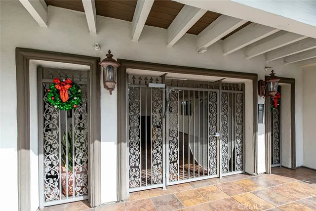 a view of balcony with wooden floor and fence