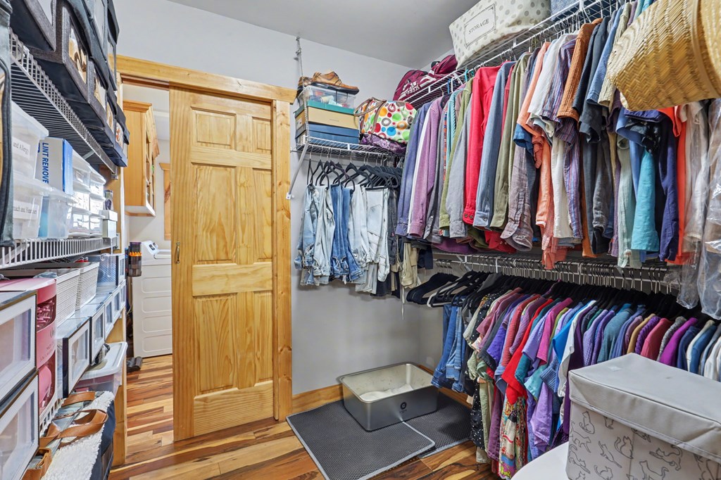4760 Anderson Road Hiawassee, GA 30546 - Photo 39 of 104 a view of walk in closet with clothes and shoes