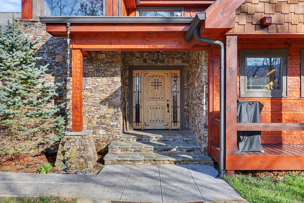 4760 Anderson Road Hiawassee, GA 30546 - Photo 4 of 104 a front view of a building with a outdoor shower