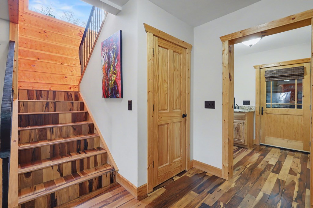 4760 Anderson Road Hiawassee, GA 30546 - Photo 42 of 104 a view of front door with wooden floor and windows
