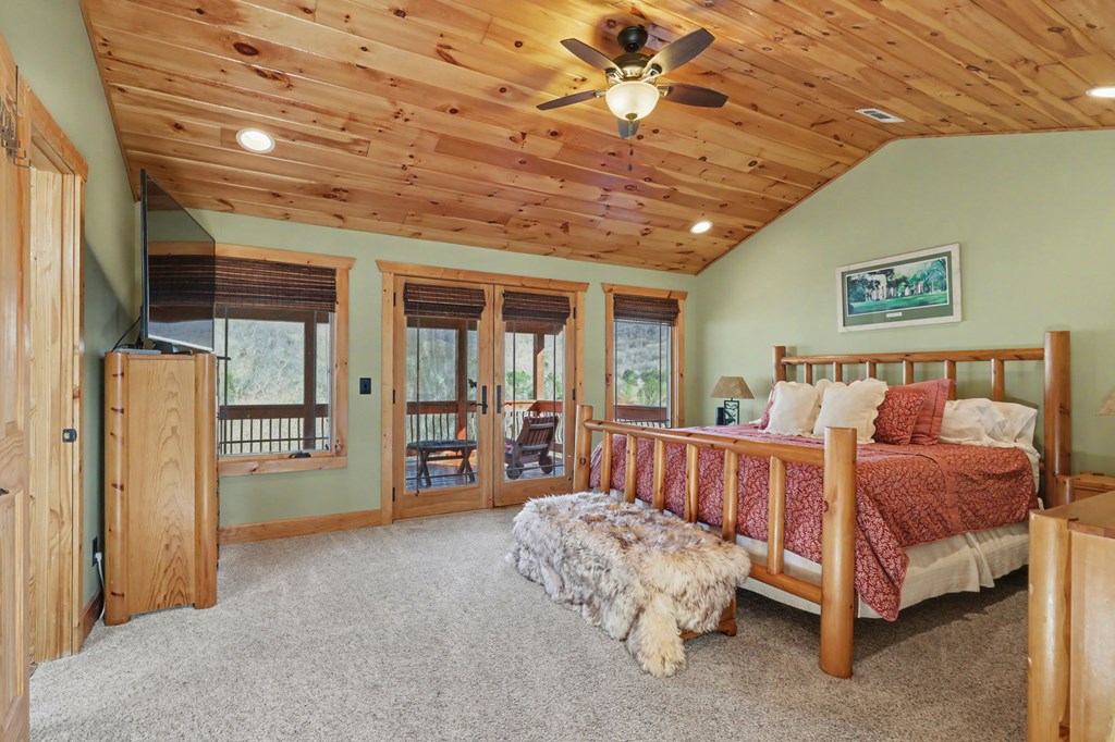 4760 Anderson Road Hiawassee, GA 30546 - Photo 48 of 104 a bed room with a bed and a large window