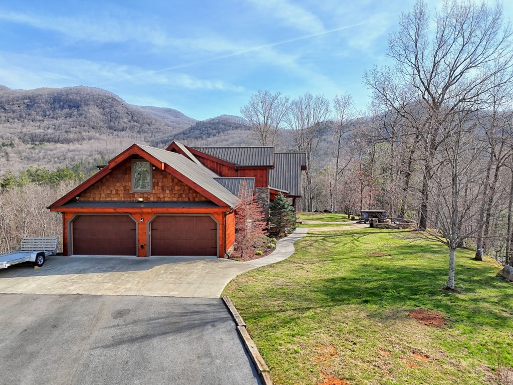 4760 Anderson Road Hiawassee, GA 30546 - Photo 73 of 104 a front view of a house with a yard