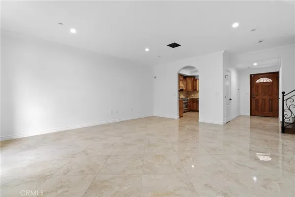 a kitchen with granite countertop stainless steel appliances and counter space