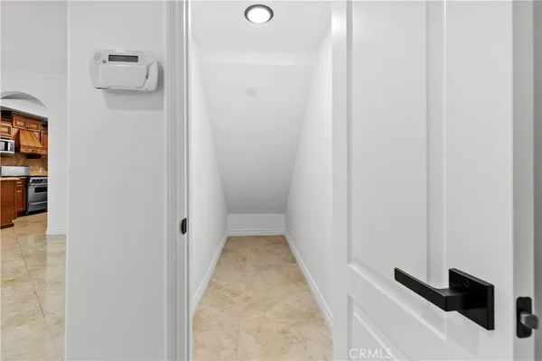 a kitchen with stainless steel appliances granite countertop a stove and a microwave