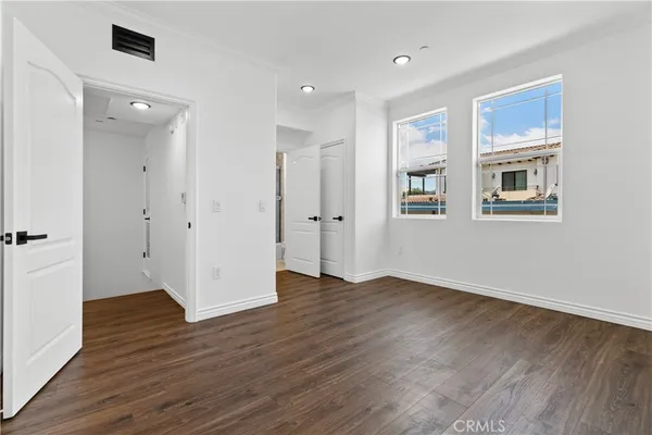 a bathroom with a sink a mirror and shower