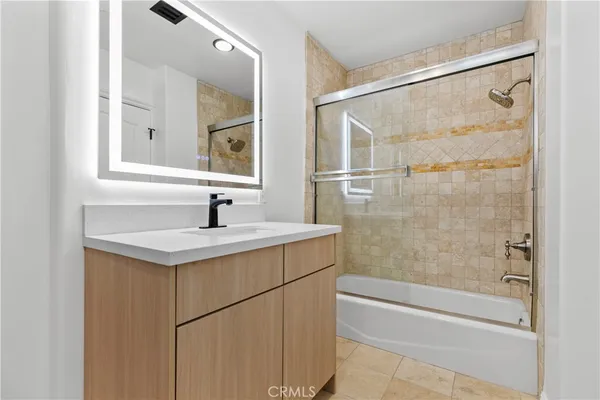 a view of a street with a building in the background