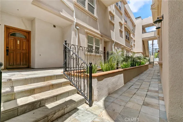 a front view of a multi story residential apartment building