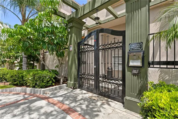 a view of a house with a street