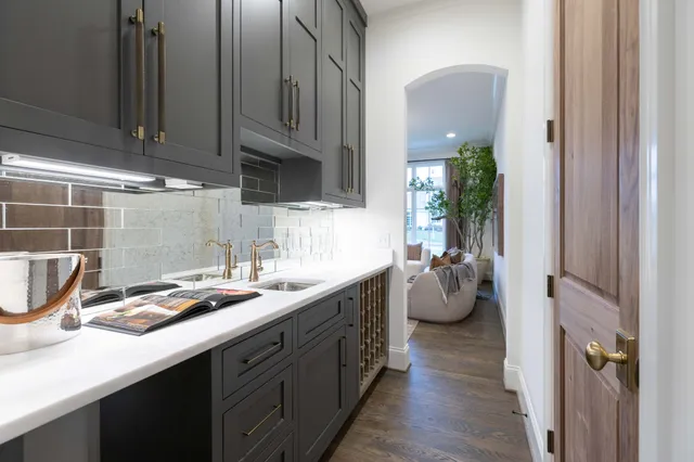 a bathroom with a sink and vanity