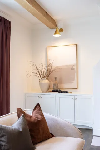 a living room with furniture and a couch