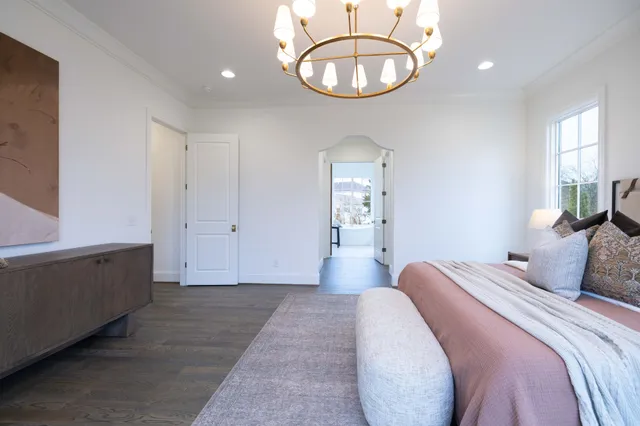 an empty room with a bathroom and a shower