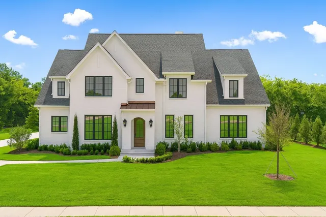 an aerial view of a house with a garden