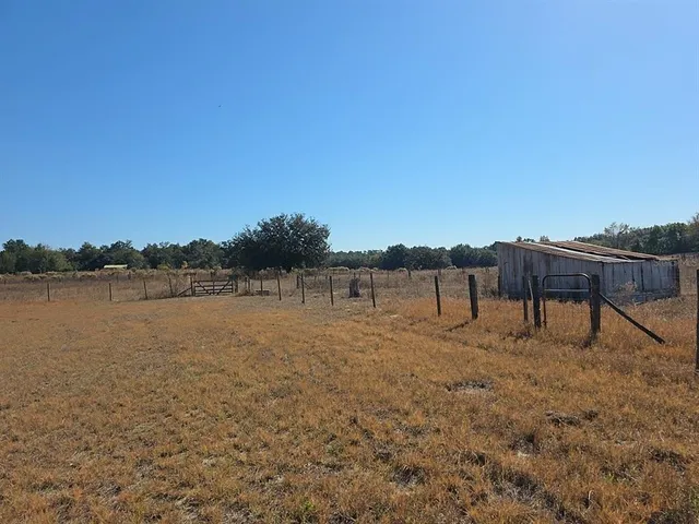 a view of a lake with mountain in the background