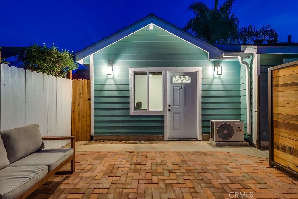 456 Cherry Avenue Long Beach, CA 90802 - Photo 13 of 74 a front view of a house with a yard