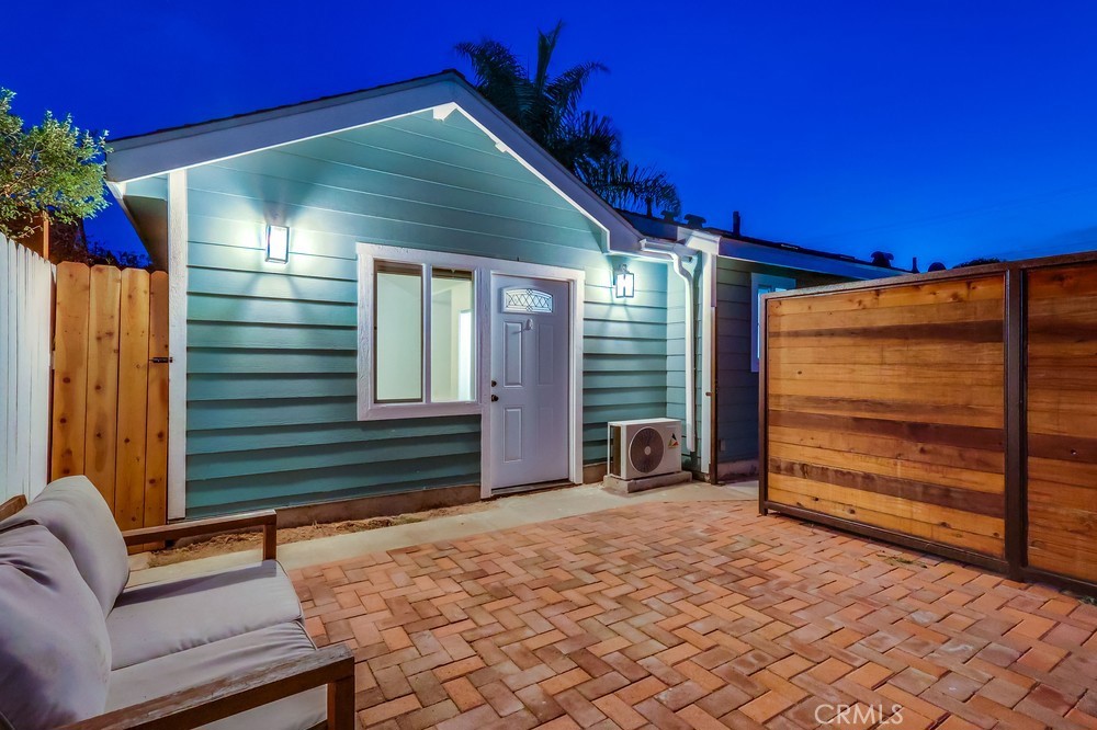 456 Cherry Avenue Long Beach, CA 90802 - Photo 14 of 74 a front view of a house with a yard