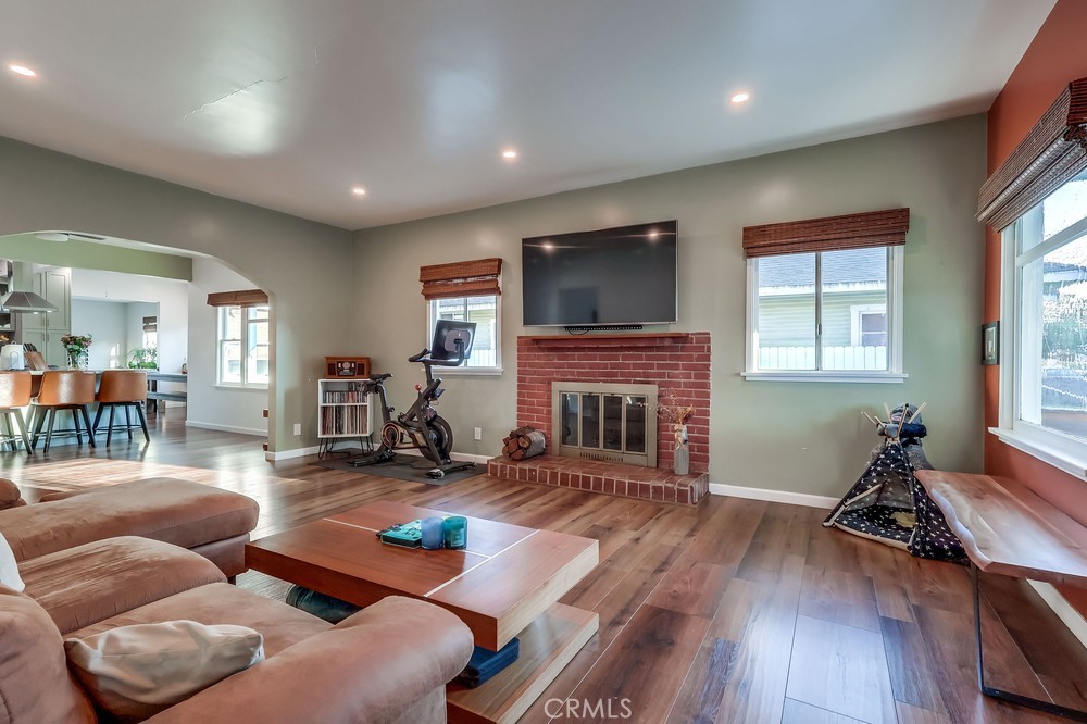 456 Cherry Avenue Long Beach, CA 90802 - Photo 16 of 74 a living room with furniture fireplace and a flat screen tv