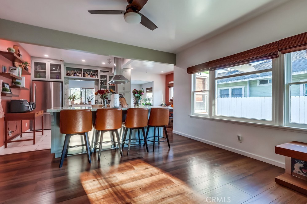456 Cherry Avenue Long Beach, CA 90802 - Photo 22 of 74 a view of a dining room with furniture window and wooden floor