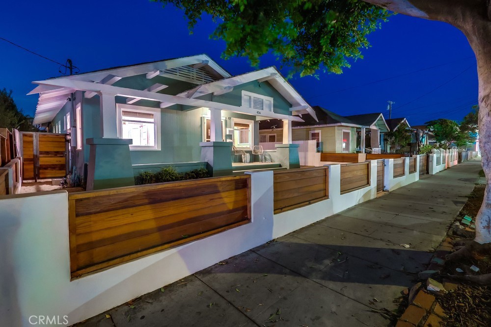 456 Cherry Avenue Long Beach, CA 90802 - Photo 3 of 74 a front view of a house with a yard