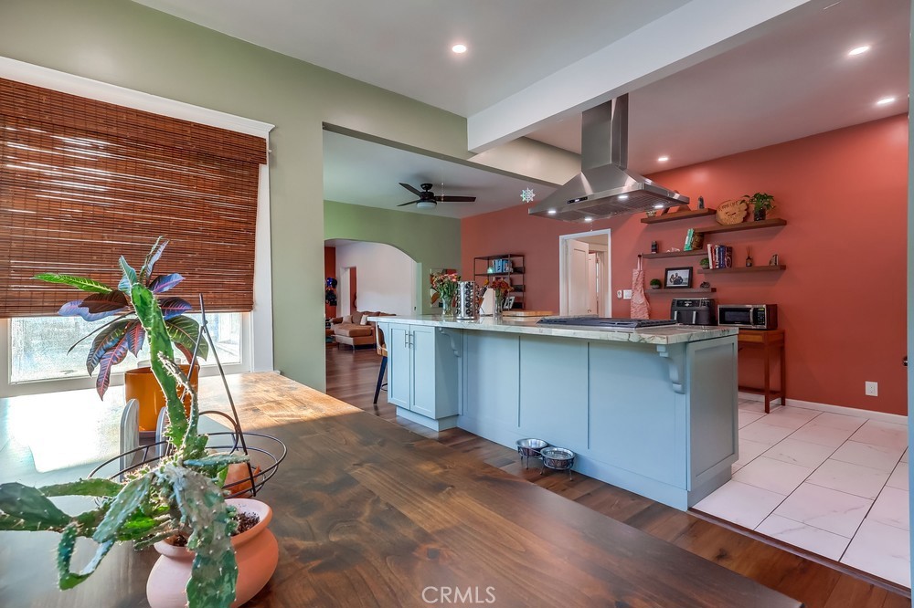 456 Cherry Avenue Long Beach, CA 90802 - Photo 35 of 74 a kitchen with counter top a potted plant and cabinets