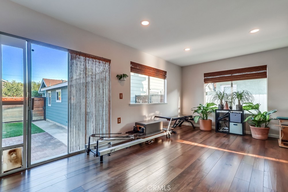 456 Cherry Avenue Long Beach, CA 90802 - Photo 41 of 74 a living room with furniture hardwood floor and a potted plant