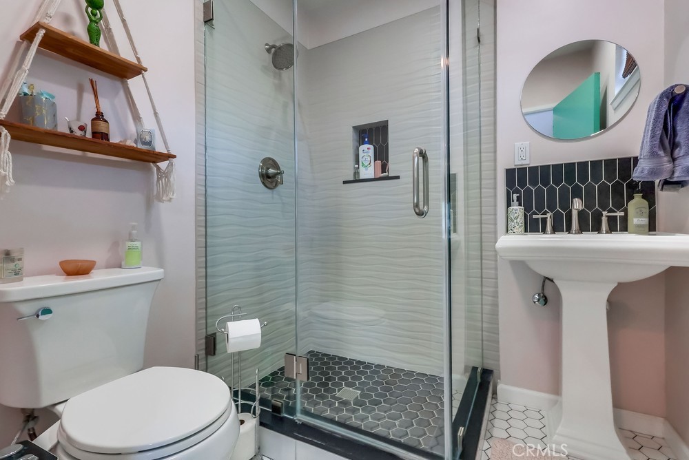 456 Cherry Avenue Long Beach, CA 90802 - Photo 43 of 74 a bathroom with a toilet a sink and shower