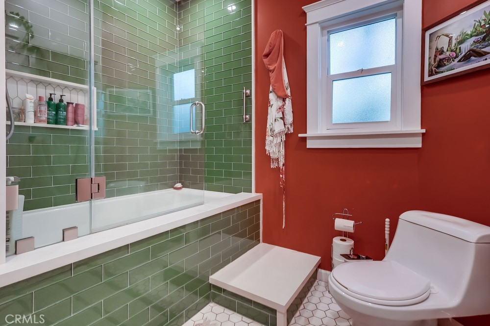 456 Cherry Avenue Long Beach, CA 90802 - Photo 56 of 74 a bathroom with a sink a toilet and shower