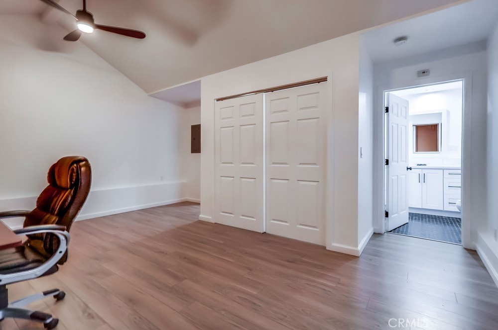 456 Cherry Avenue Long Beach, CA 90802 - Photo 62 of 74 an empty room with wooden floor and windows