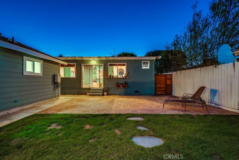 456 Cherry Avenue Long Beach, CA 90802 - Photo 10 of 74 a front view of a house with a yard