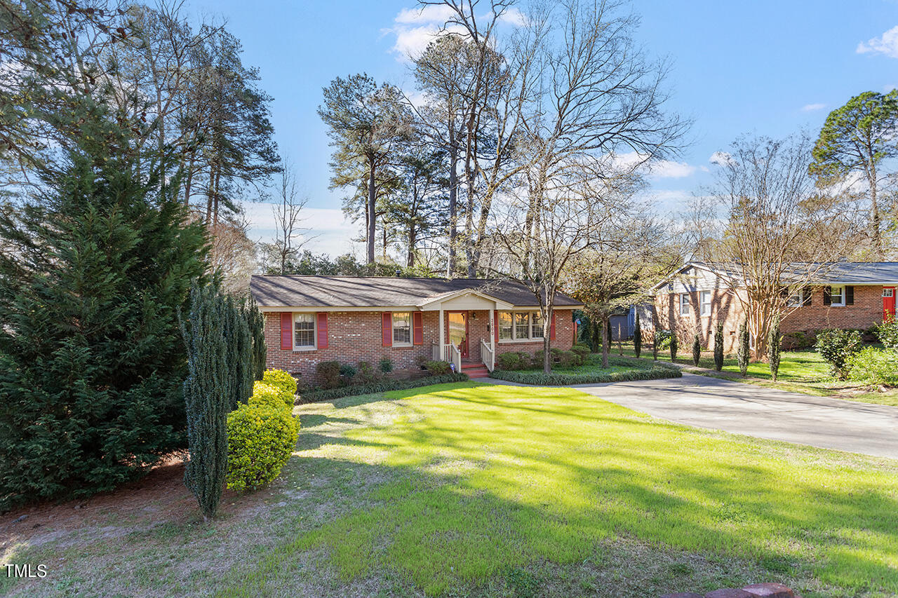 2900 New Hope Church Road Raleigh, NC 27604 - Photo 2 of 34 a front view of house with yard and green space