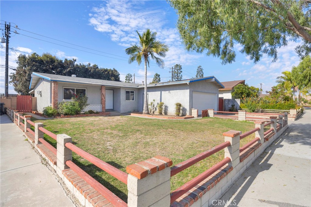 10411 Lexington Street Stanton, CA 90680 - Photo 5 of 30 a view of house with outdoor space and swimming pool