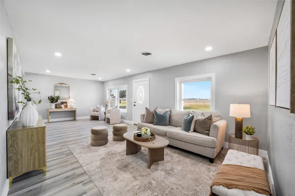 a living room with furniture and a couch