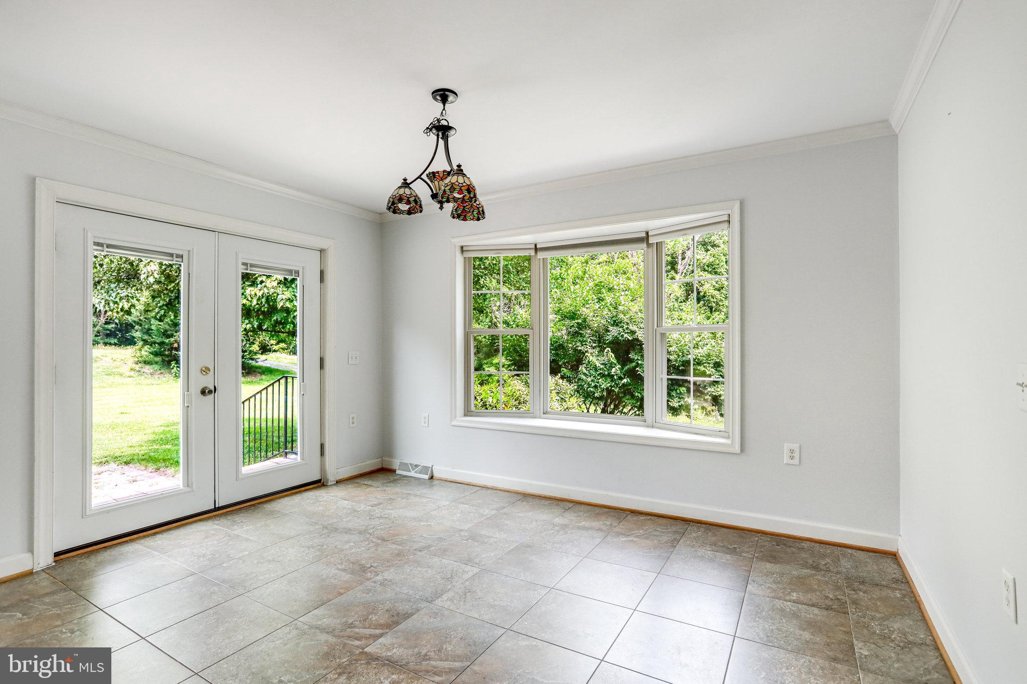 11787 Rowe Road Monrovia, MD 21770 - Photo 16 of 58 French doors from dinning area to outside patio.