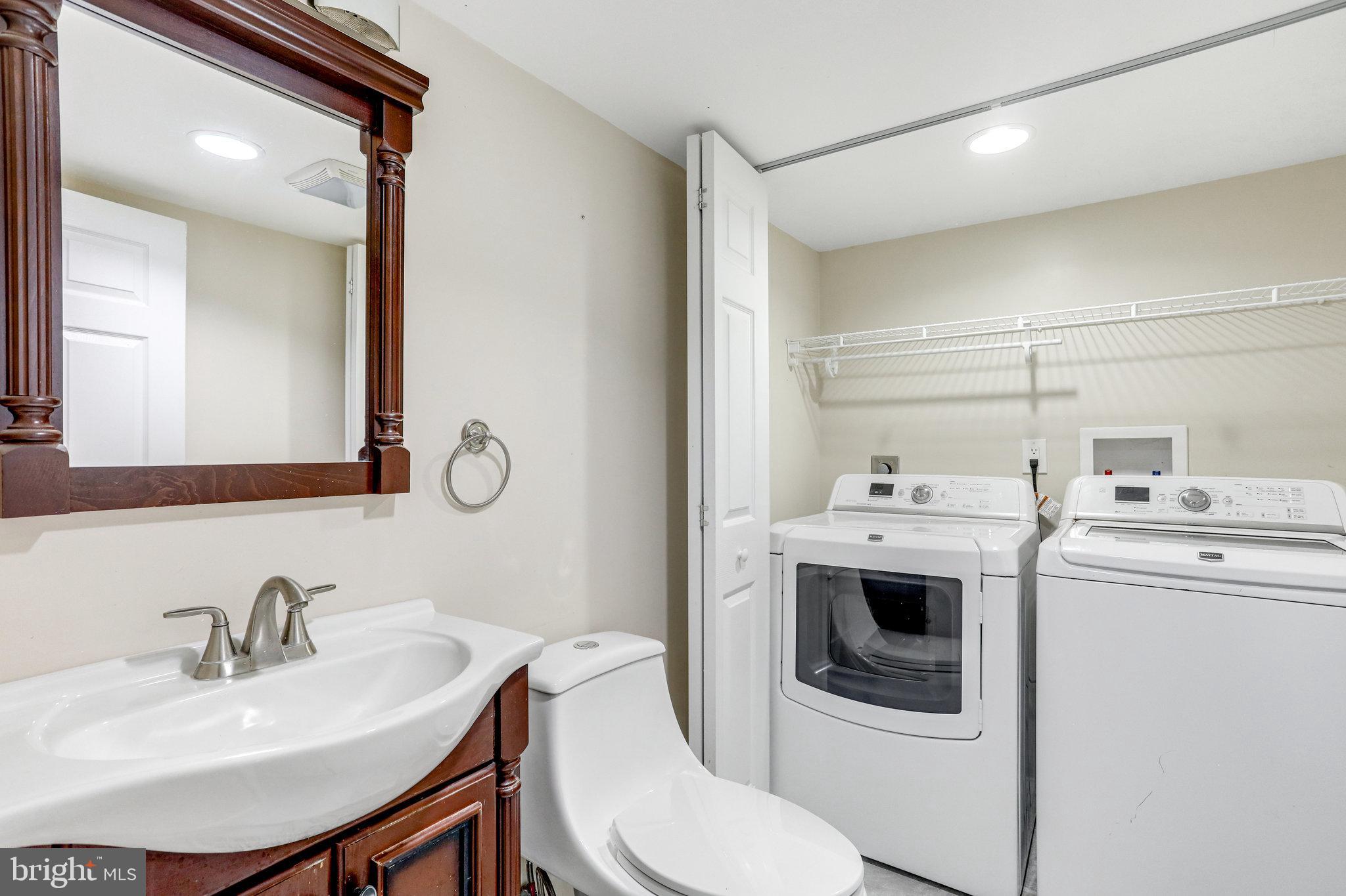11787 Rowe Road Monrovia, MD 21770 - Photo 39 of 58 Half bath and laundry on lower level.