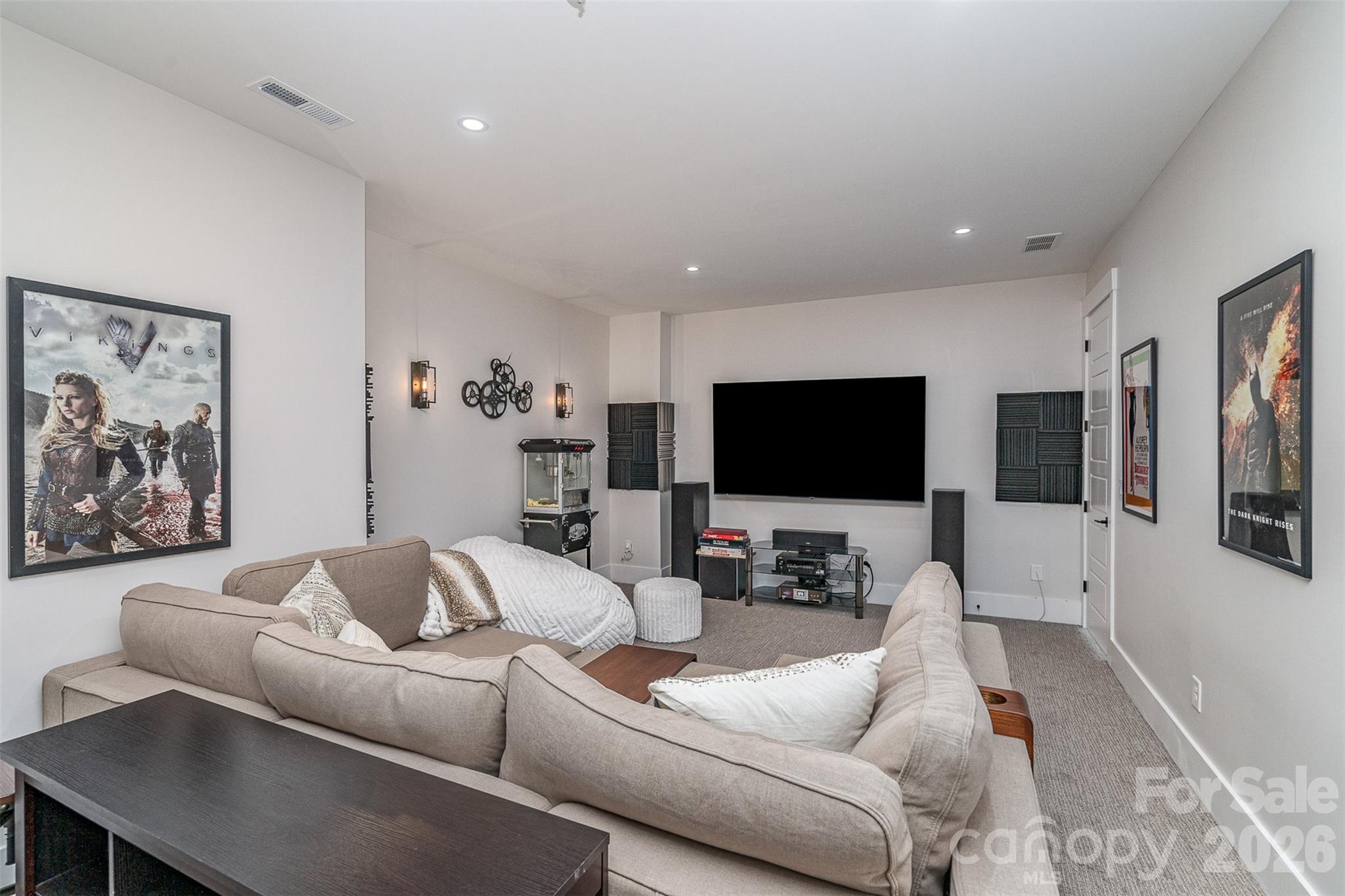 5056 Bridge Way Denver, NC 28037 - Photo 29 of 42 a living room with furniture and a flat screen tv