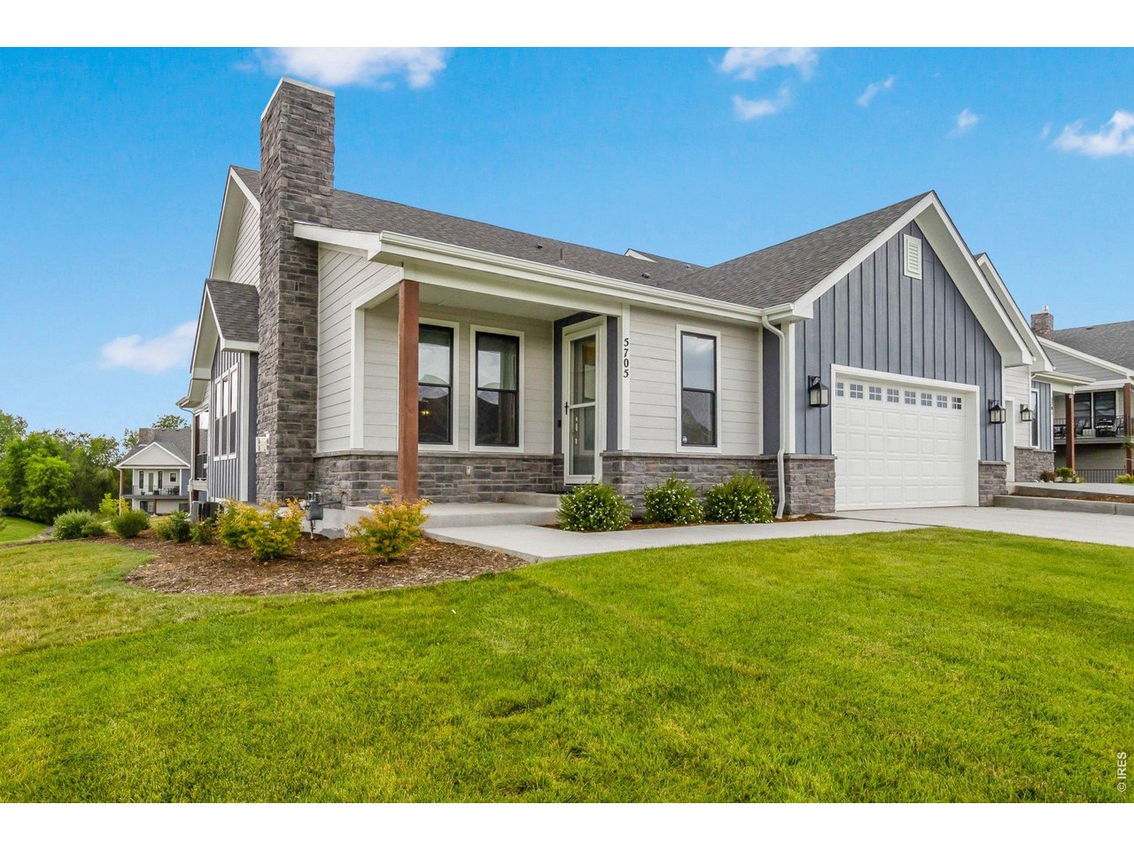 5705 2nd Road Greeley, CO 80634 - Photo 6 of 46 A very striking curb appeal with a large, welcoming covered front porch