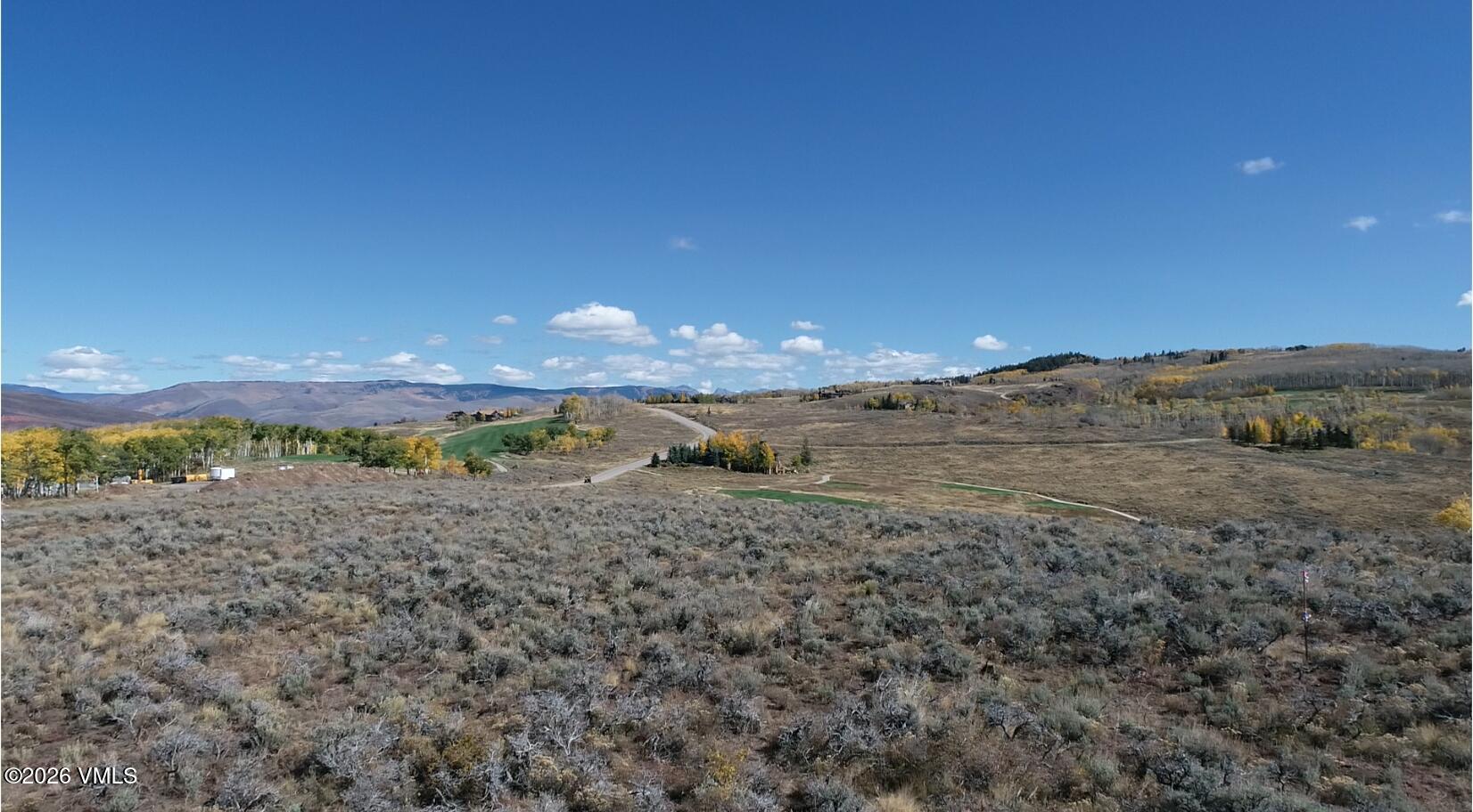 36 Webb Peak Edwards, CO 81632 - Photo 7 of 18 a view of a dry yard with trees
