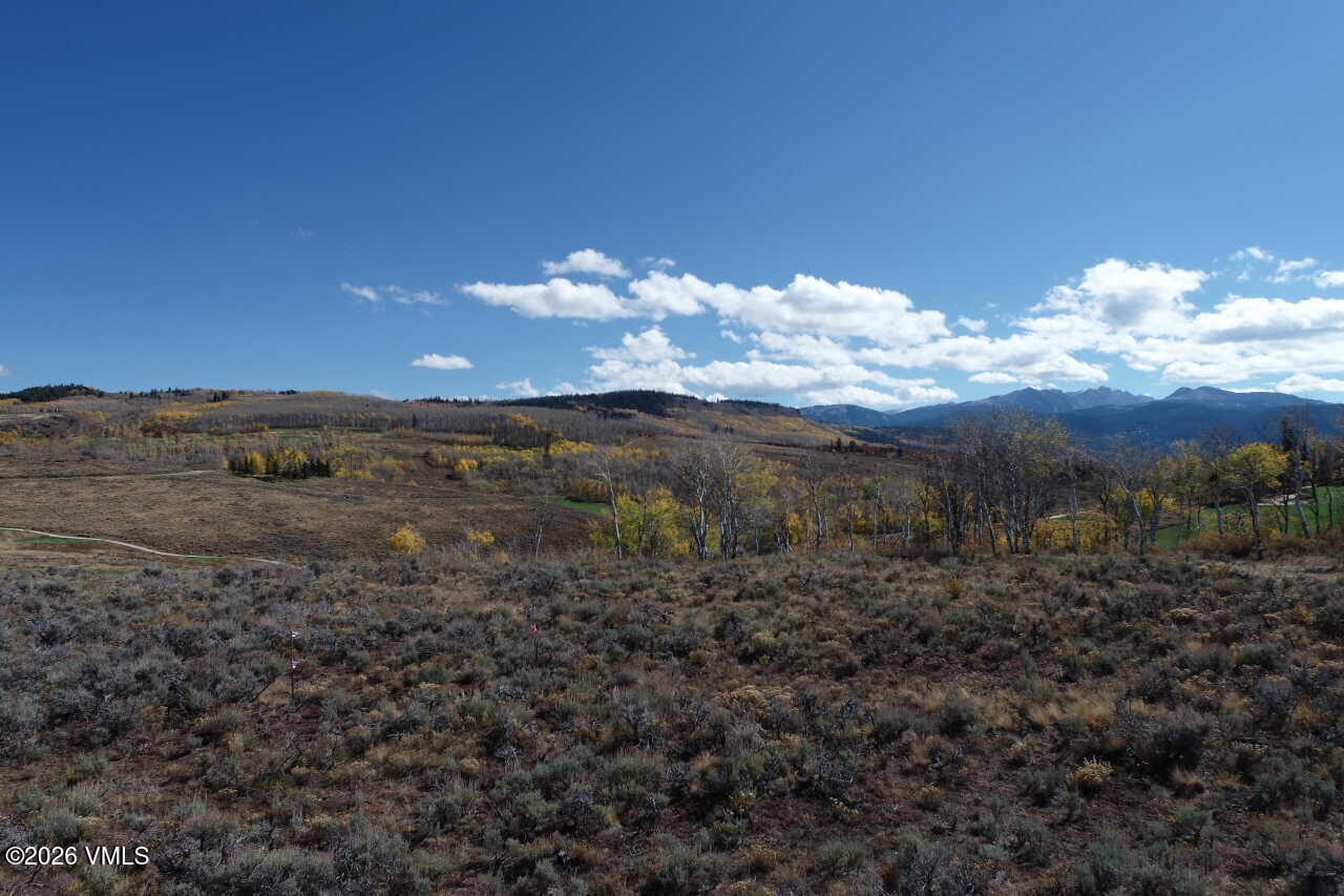 36 Webb Peak Edwards, CO 81632 - Photo 8 of 18 a view of a big yard with beach and mountain view