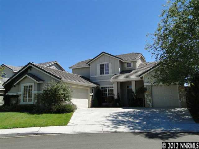 10550 Iron Ridge Court Reno, NV 89521 - Photo 1 of 1 a view of a house with a yard and large tree