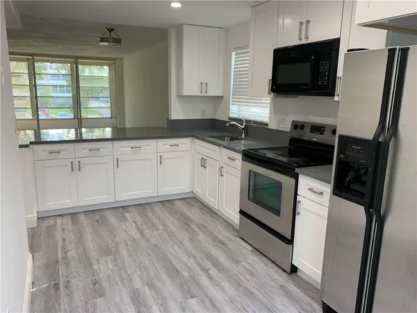 $2,000 | 8390 Sands Point Boulevard, Unit 210F, Tamarac, FL 33321