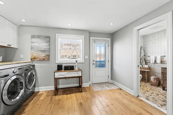 a view of a livingroom with furniture and front door
