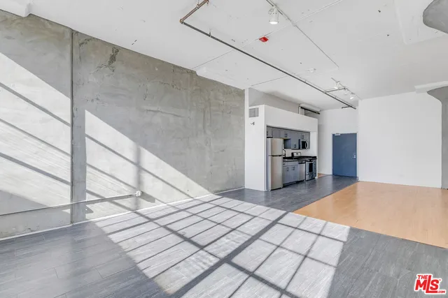 a view interior of a house an entryway and fire place