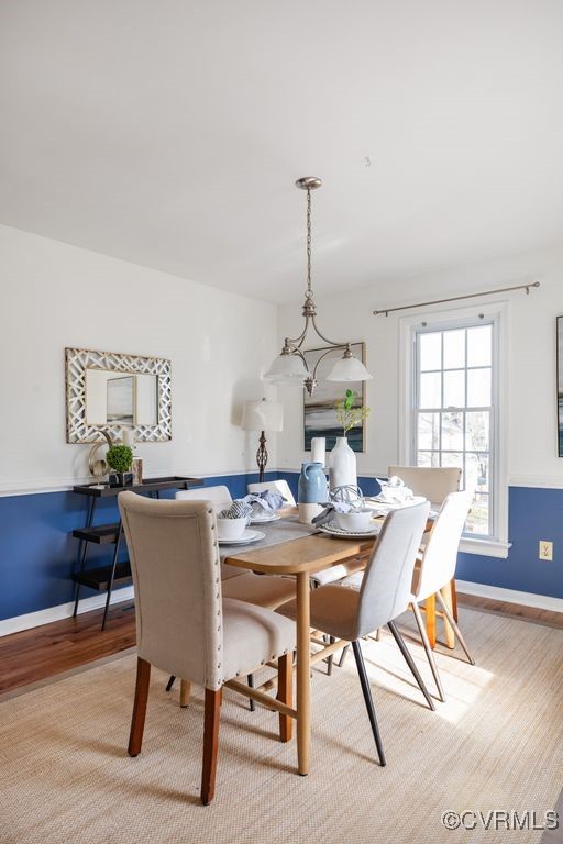 5803 Mill Spring Road Midlothian, VA 23112 - Photo 14 of 48 a view of a dining room with furniture window and wooden floor