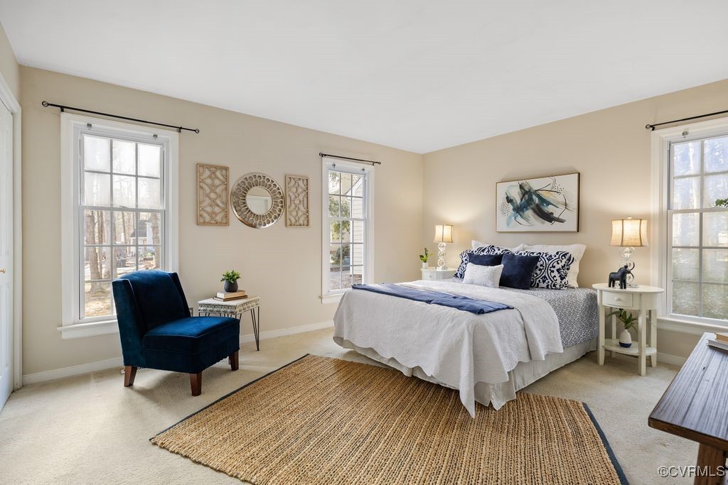 5803 Mill Spring Road Midlothian, VA 23112 - Photo 15 of 48 a bedroom with a bed and a window