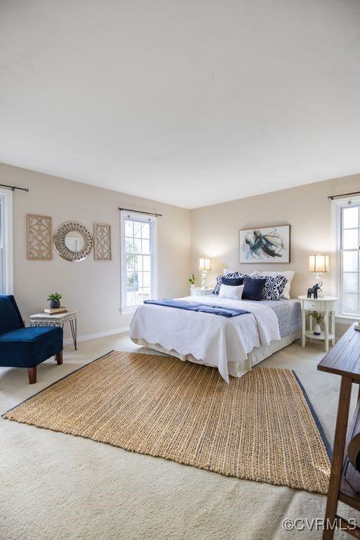 5803 Mill Spring Road Midlothian, VA 23112 - Photo 17 of 48 a spacious bedroom with a bed and window