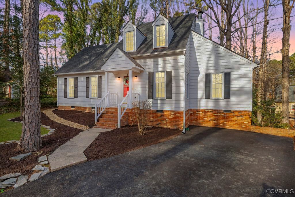 5803 Mill Spring Road Midlothian, VA 23112 - Photo 2 of 48 a front view of a house with a yard