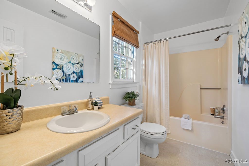 5803 Mill Spring Road Midlothian, VA 23112 - Photo 25 of 48 a bathroom with a granite countertop sink toilet and shower
