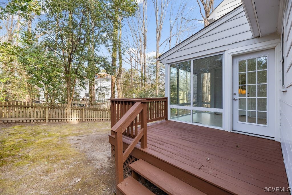 5803 Mill Spring Road Midlothian, VA 23112 - Photo 26 of 48 a view of a roof deck with wooden floor and fence