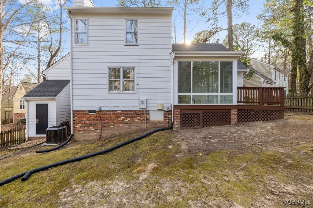 5803 Mill Spring Road Midlothian, VA 23112 - Photo 30 of 48 a view of house with yard and glass windows