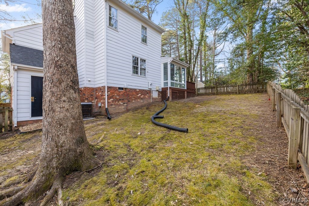 5803 Mill Spring Road Midlothian, VA 23112 - Photo 31 of 48 a view of a yard with brick house